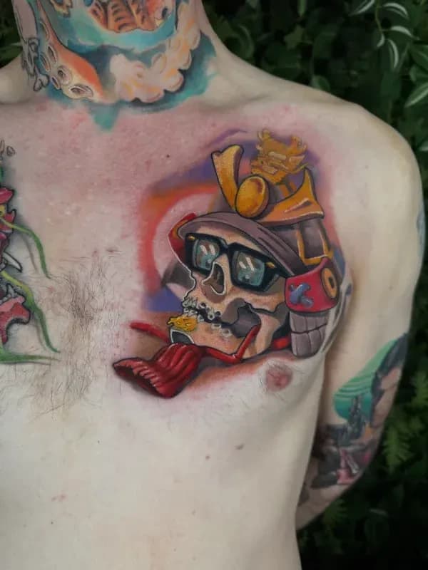 Crisp colour line-and-fill tattoo by Juan Del Pino at Phantom Avenue, Edmonton