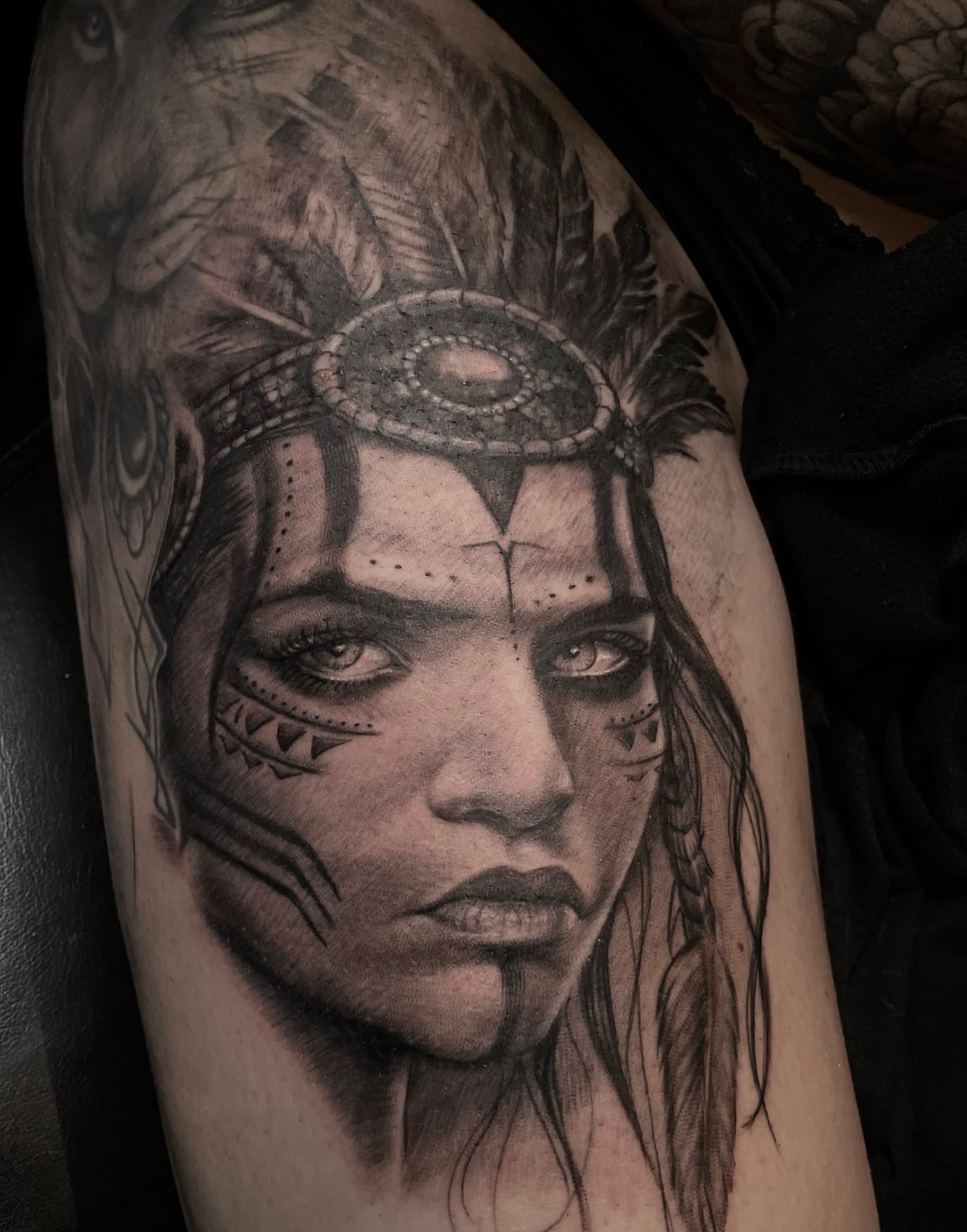 Portrait tattoo of a female warrior