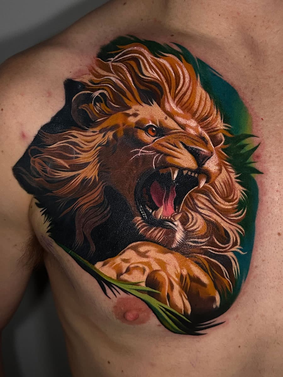 Lion tattoo by Artem Nebesnyi