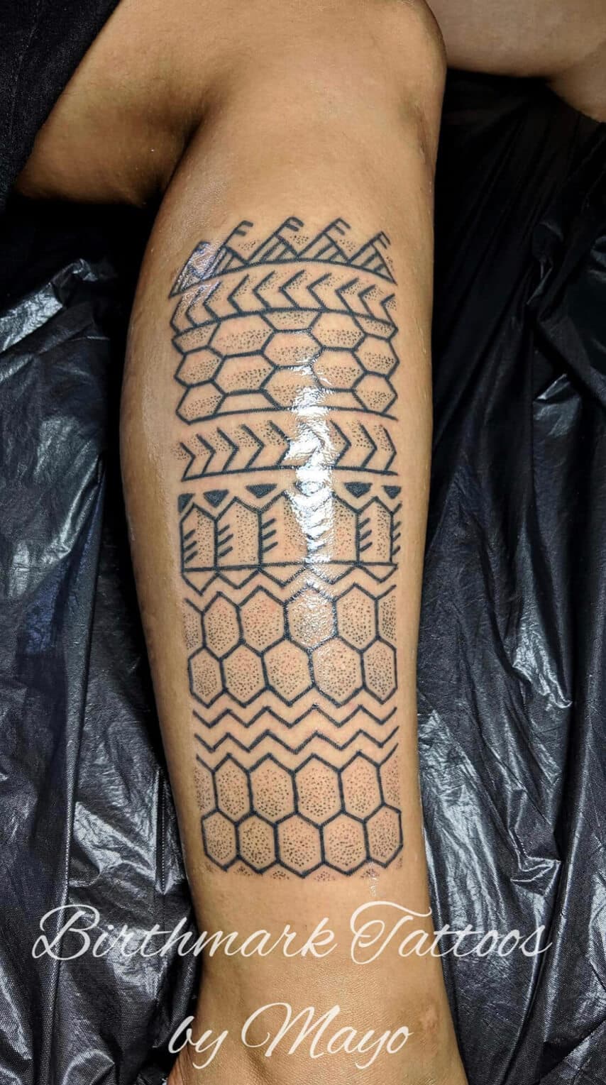Photographie issue du portfolio officiel de Mayo Landicho, artiste présenté par Birthmark Tattoos