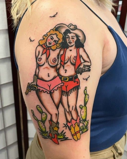 cute, queer, traditional cowgirls tattooed on upper arm