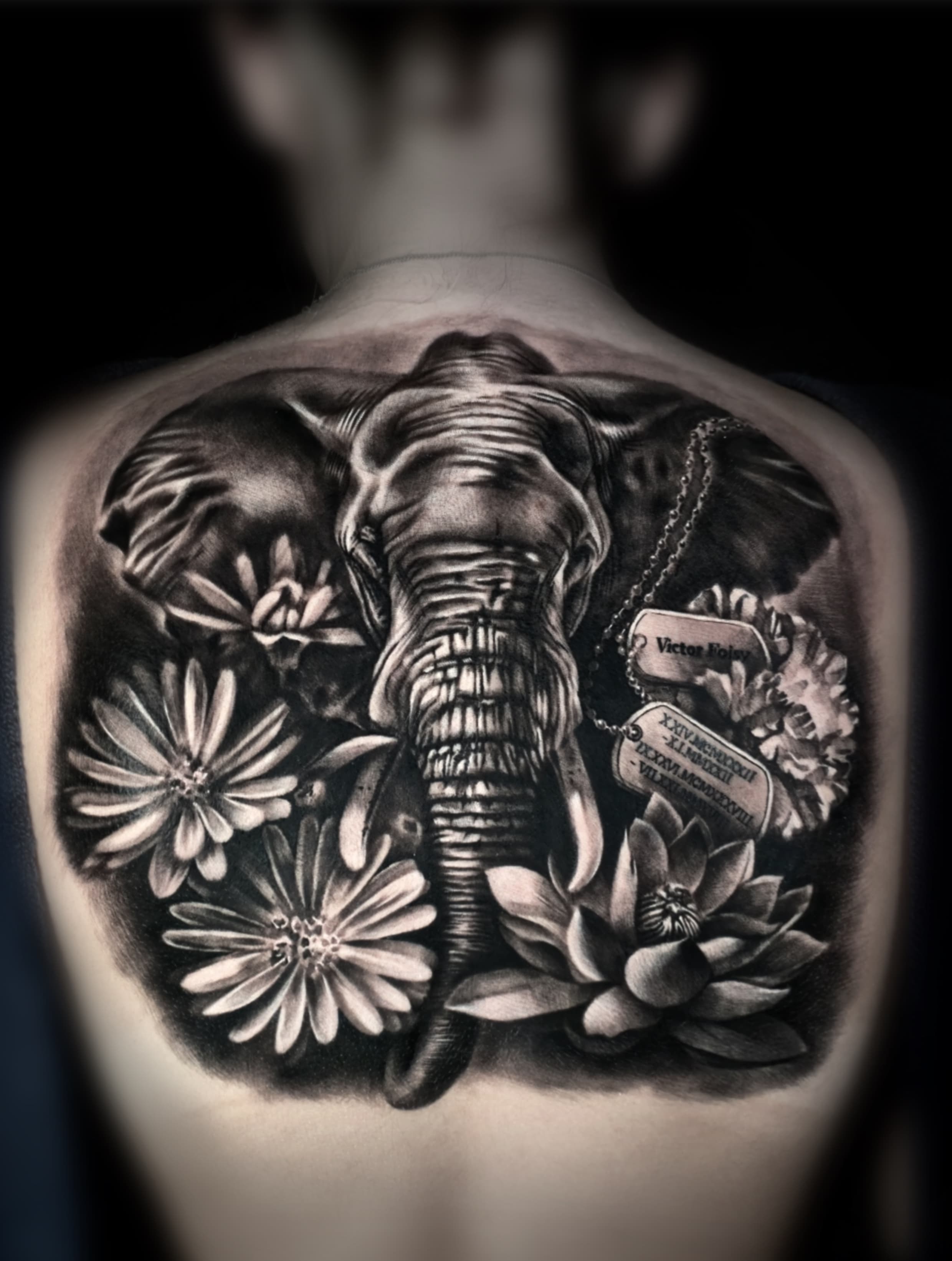 Completed elephant and floral back tattoo in Hyunjoo Cho's official portfolio