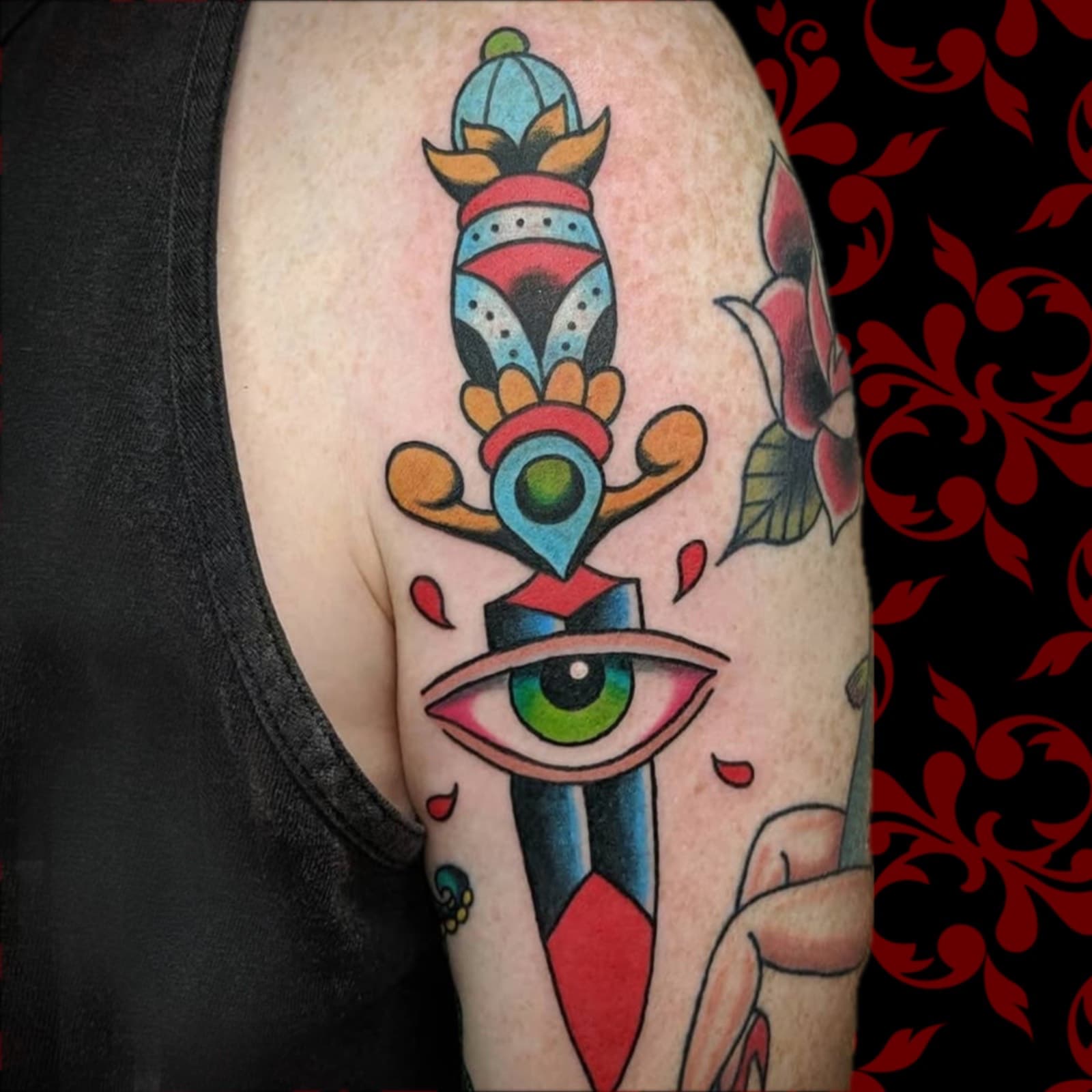 Jen Black Toronto tattoo artist tattooing out of Lewis Family Tattoo Company 2235A Dundas Street West colour tattoo