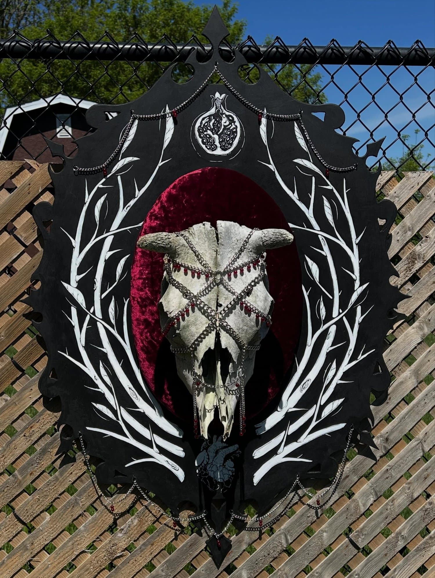 My art piece for the @gauntlet.tattoo “Death and Rebirth” art show 🖤 Her name is “Anthesterion” and she is for sale. Cow skull, chain an