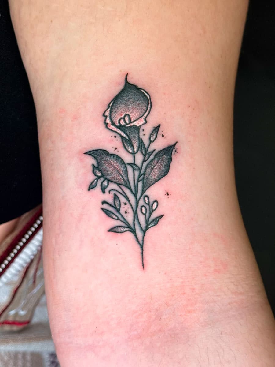 Small flower tattoo by Harrison Ortega