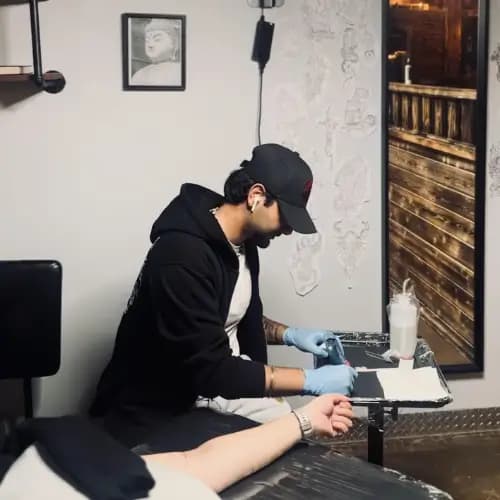 Portrait de Amrit Chahal — Marc'd Up Tattoos