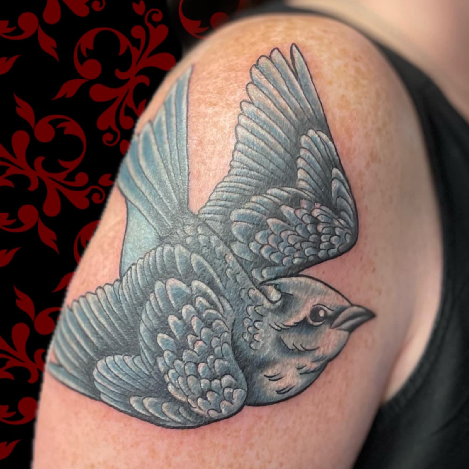 Jen Black Toronto tattoo artist tattooing out of Lewis Family Tattoo Company 2235A Dundas Street West colour tattoo