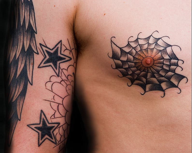 A painful nipple tattoo on Kyle. Spider web and sleeve in progress. 2014