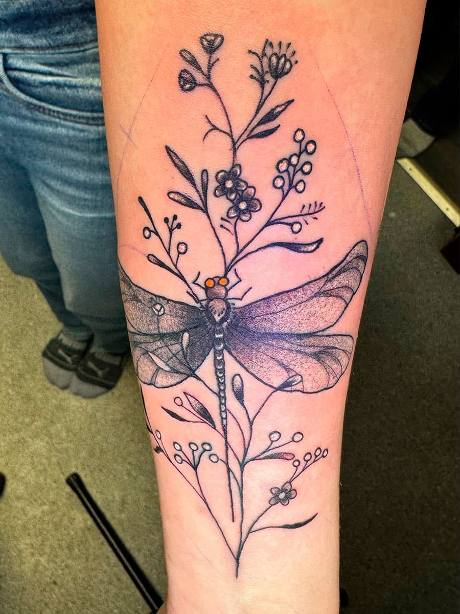 Dragonfly tattoo by Harrison Ortega