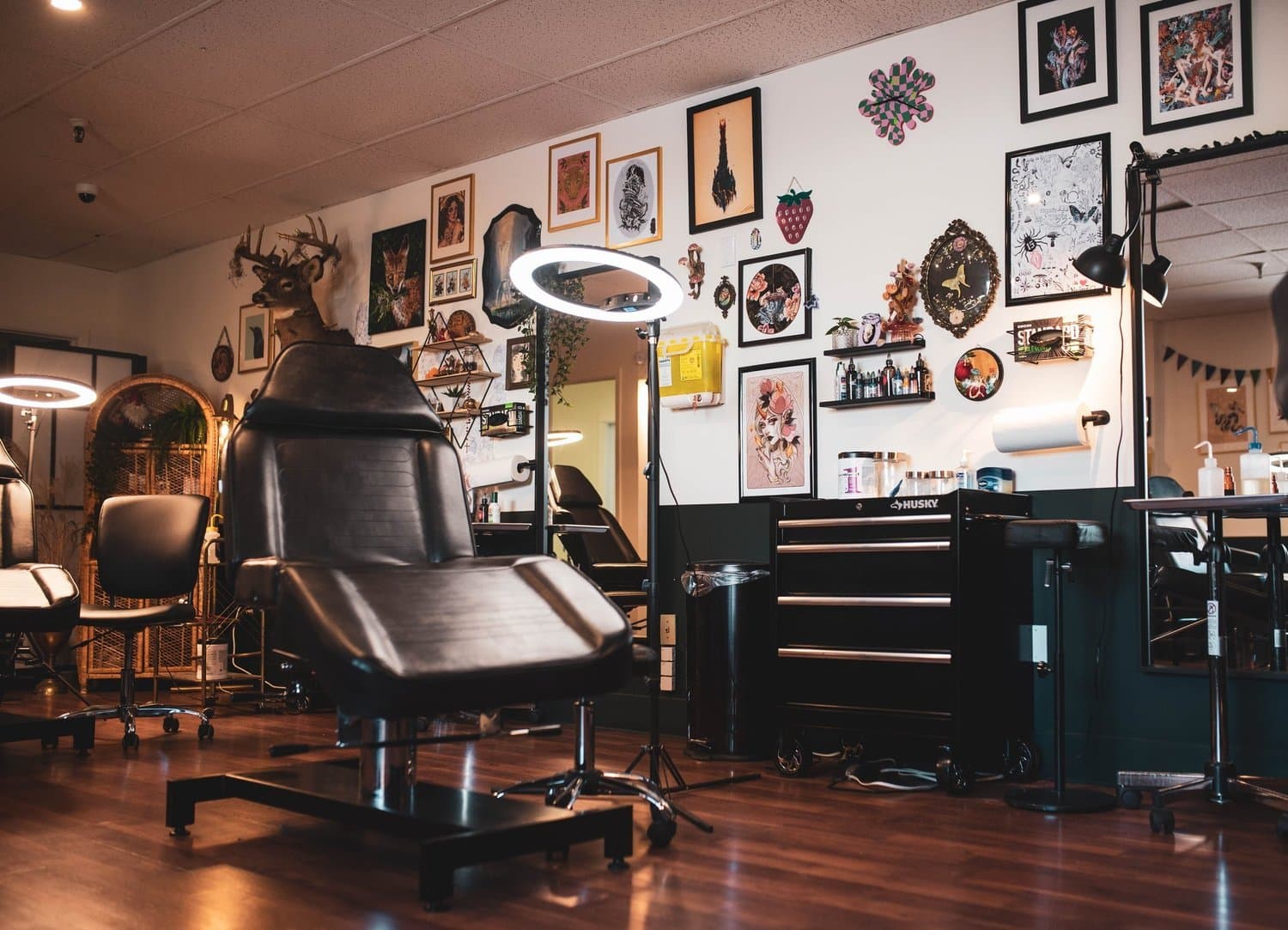 Black Eleven Tattoo studio in Halifax with a workstation setup showcasing the studio's creative vibe