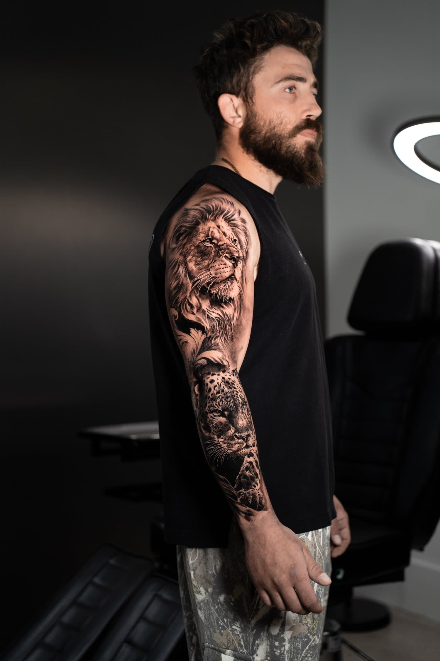 Black and grey realism full sleeve tattoo by Luis Fernandez at Zen Tattoo Studio, Oakville. Large scale sleeve featuring wildlife and mythology — photographed i