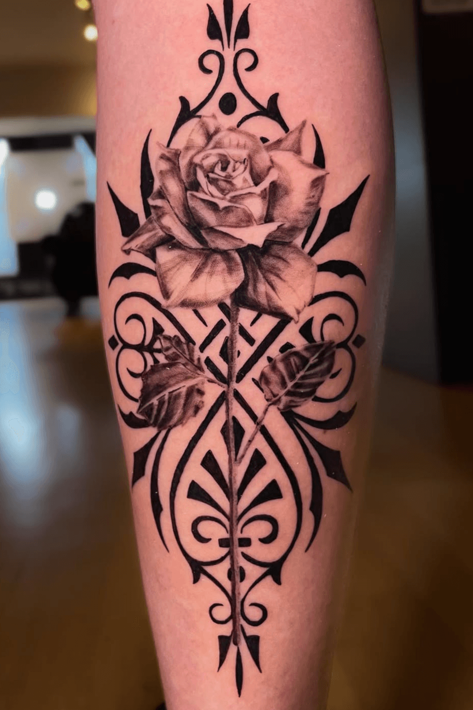 Rose tattoo done by @calahan.woodwolf