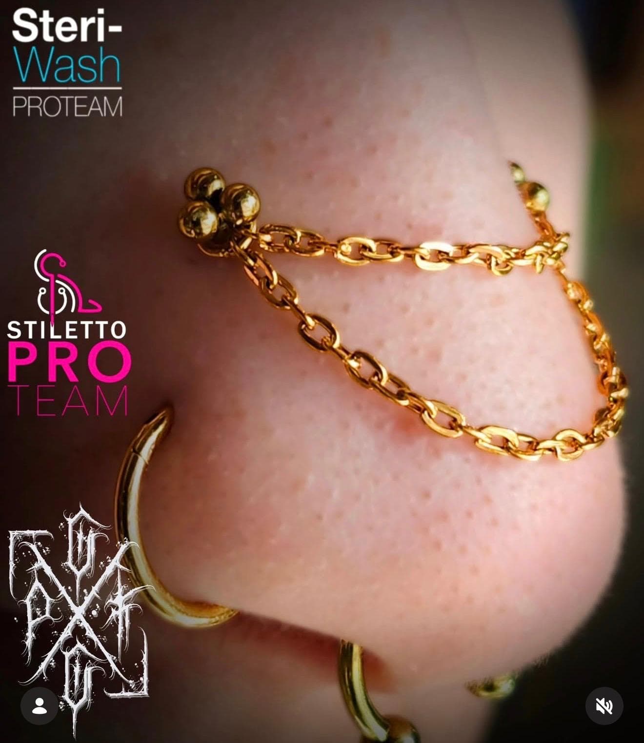 Gold nose chain connecting nostril piercings with curated luxury body jewelry in Winnipeg.