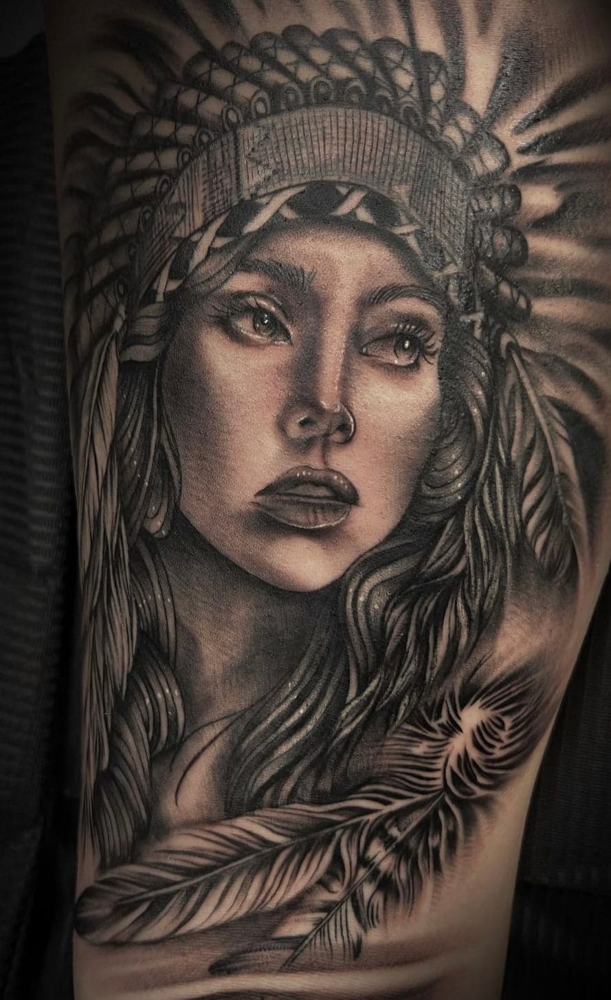 Black and grey native portrait by tattoo artist Yvon_ink at Sundog Studios Airdrie Tattoo Shop