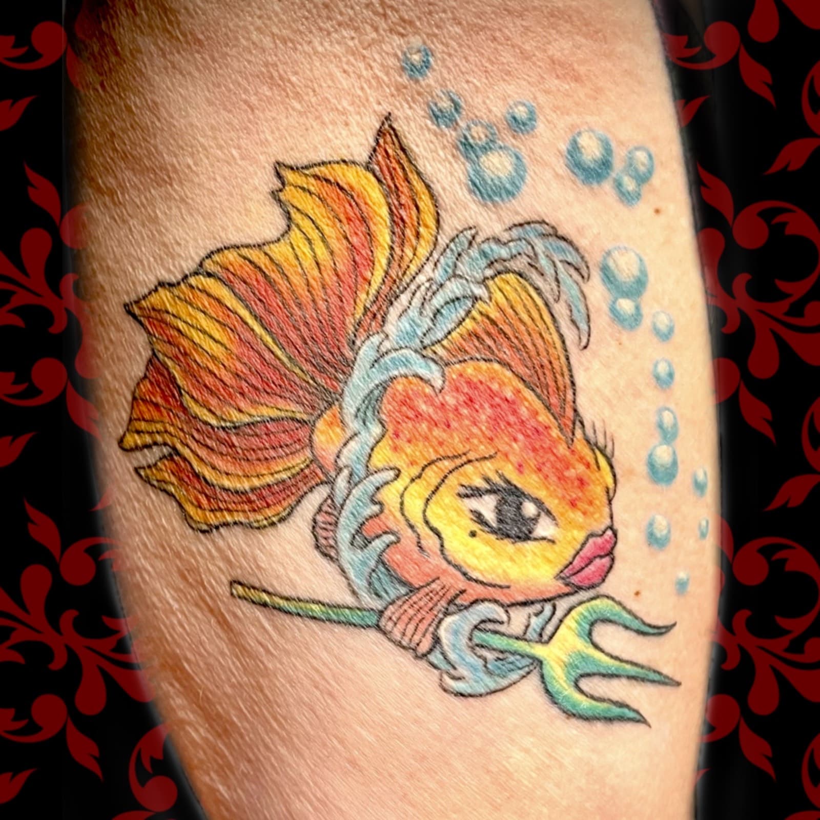 Jen Black Toronto tattoo artist tattooing out of Lewis Family Tattoo Company 2235A Dundas Street West colour tattoo