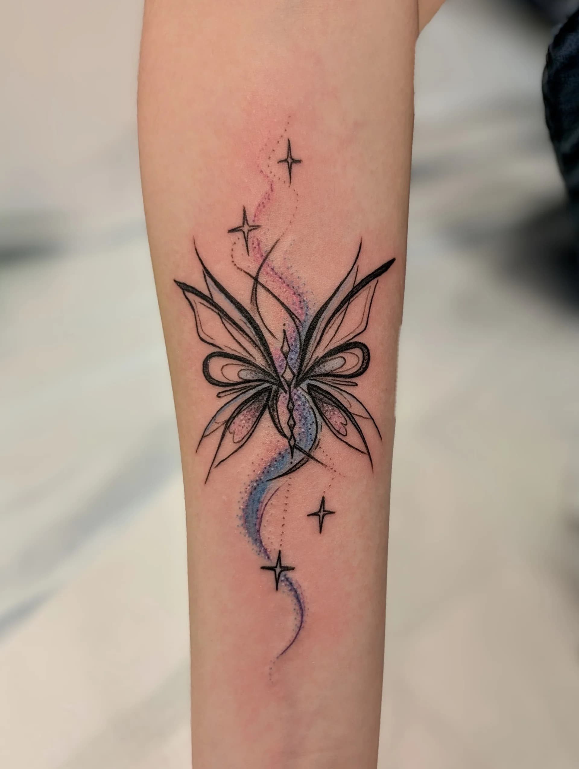 Whispy Butterfly Black Blue - watercolor tattoo by Saskatoon tattoo artist