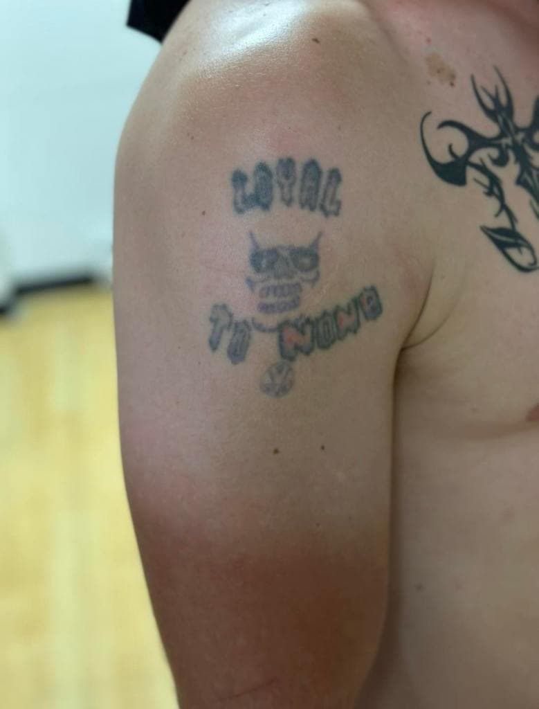 New West custom lettering tattoo
