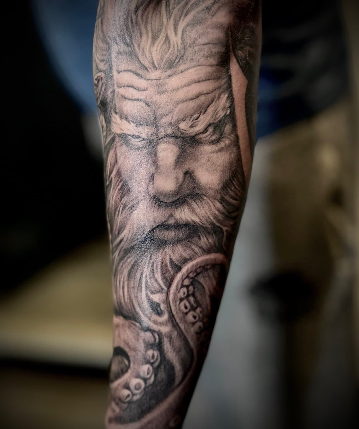 Greek god half sleeve tattoo