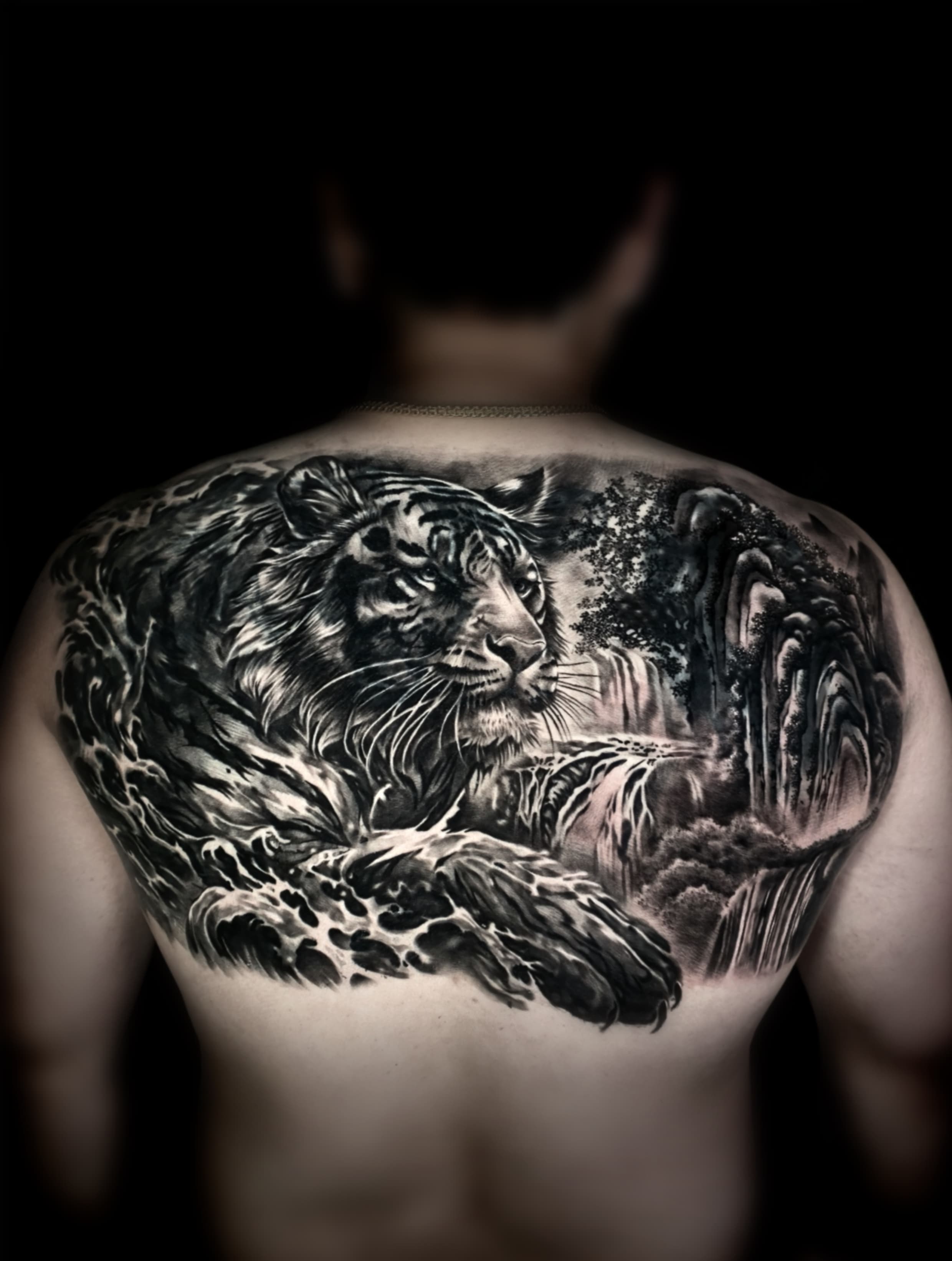 Completed tiger landscape back tattoo in Hyunjoo Cho's official portfolio