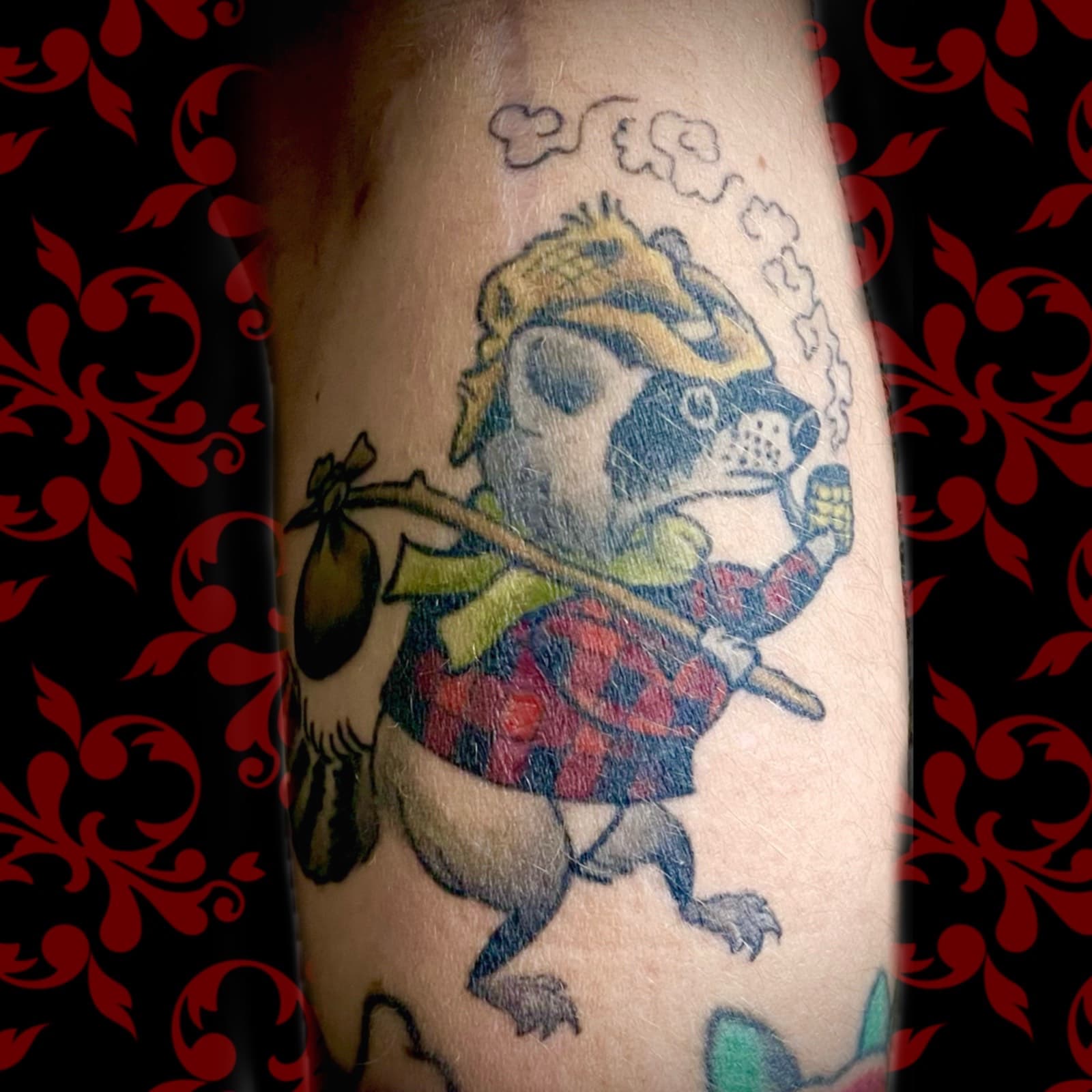 Jen Black Toronto tattoo artist tattooing out of Lewis Family Tattoo Company 2235A Dundas Street West colour tattoo