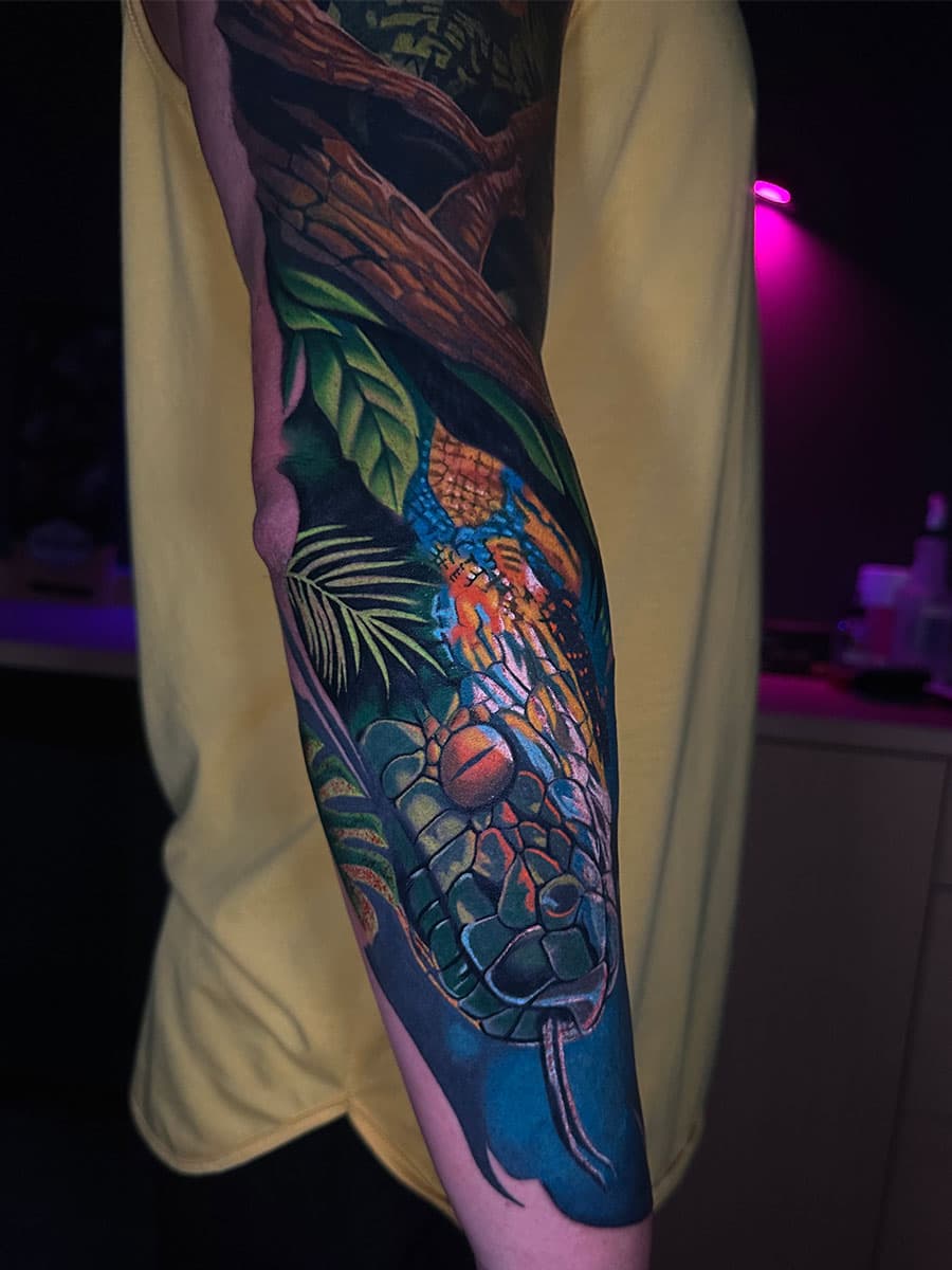 Snake tattoo by Artem Nebesnyi