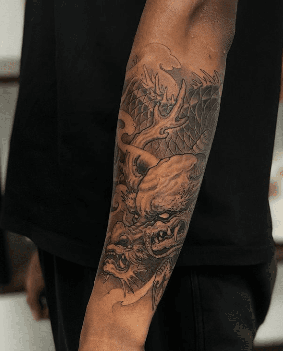 forearm dragon sleeve tattoo. toronto tattoo shop