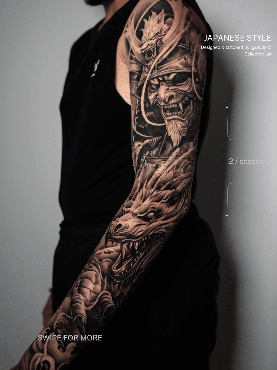 A person's arm with a Japanese style tattoo of a fierce tiger and a traditional Japanese warrior with a helmet and beard, in black and grey ink.