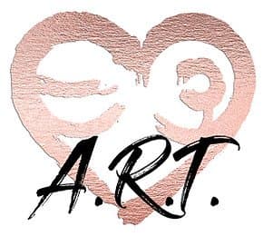 A drawing of a pink heart with an eye and ear inside, and the text "A.R.T." written in black.